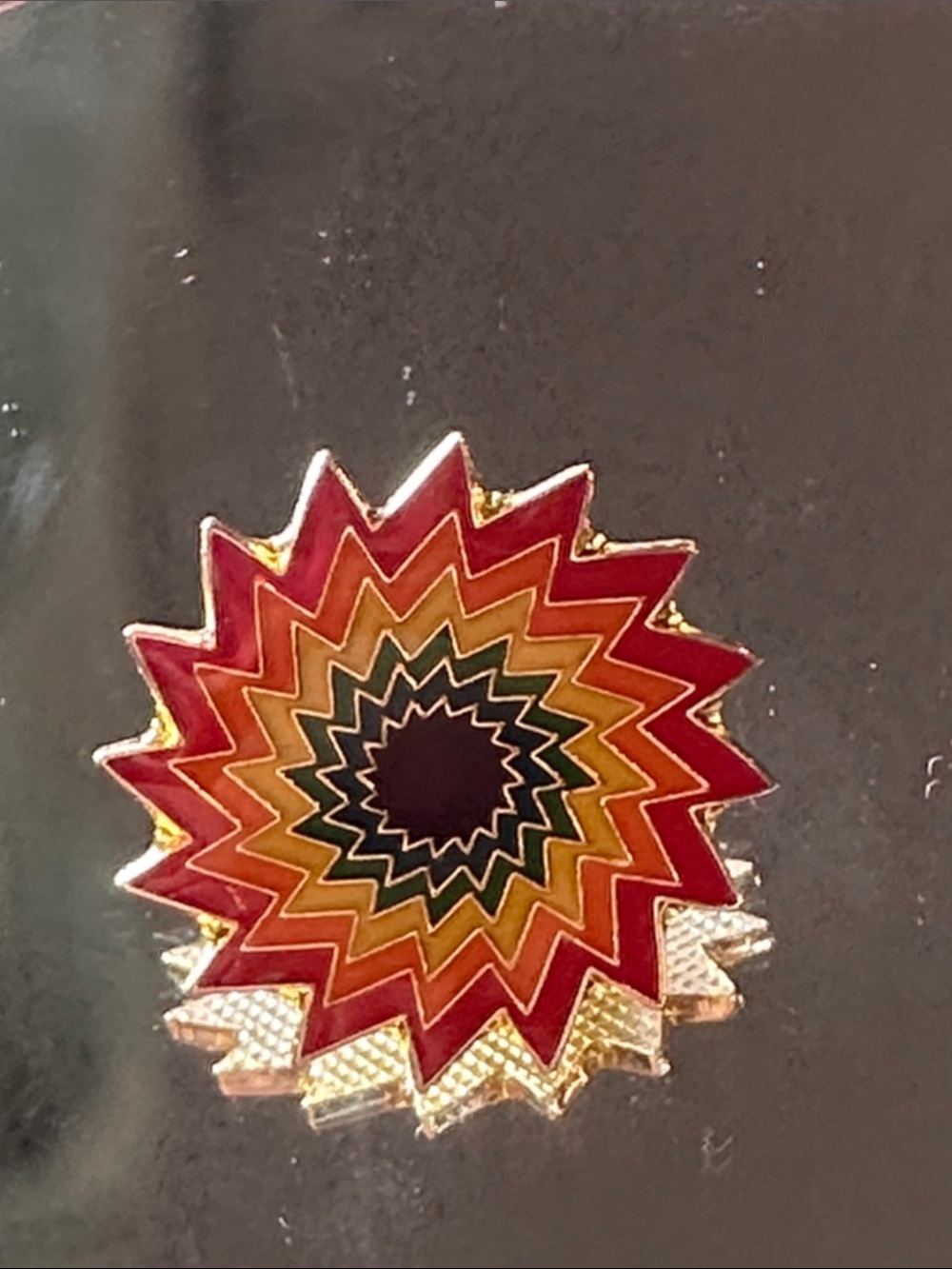Colorburst Starburst Enamel Lapel Pin in Red, Orange, Green